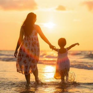 mother and child at the beach